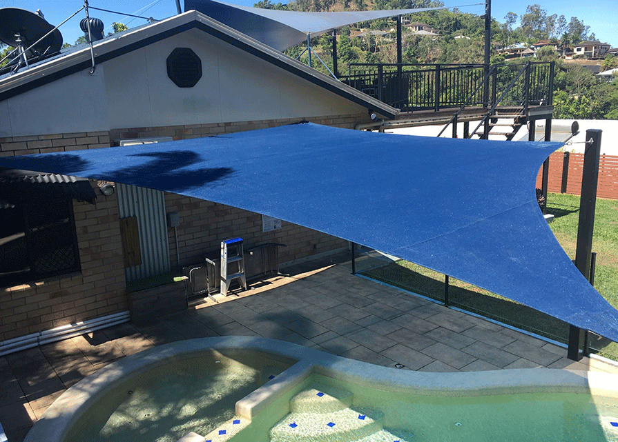 Blue shade sail pool area
